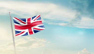 United Kingdom waving flag in beautiful sky.