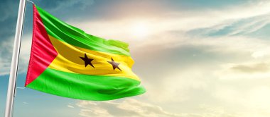 Sao Tome and Principe waving flag in beautiful sky with sun