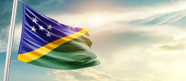 Solomon Islands waving flag in beautiful sky with sun