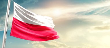 Poland waving flag in beautiful sky with sun