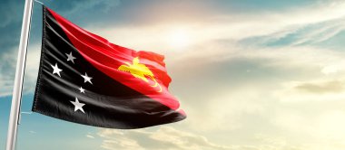 Papua New Guinea waving flag in beautiful sky with sun