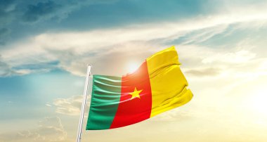 Cameroon waving flag in beautiful sky with sun