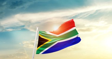 South Africa waving flag in beautiful sky with sun