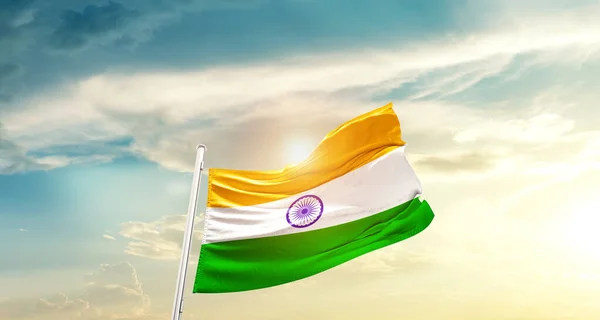 India waving flag in beautiful sky with sun