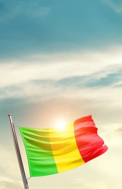 Mali waving flag in beautiful sky with sun