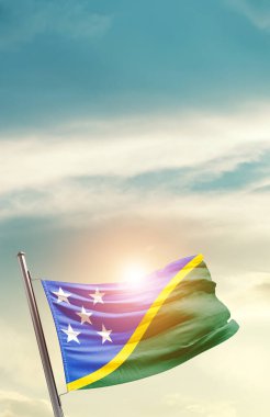 Solomon Islands waving flag in beautiful sky with sun