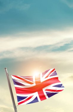 United Kingdom waving flag in beautiful sky with sun