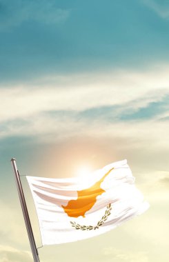 Cyprus waving flag in beautiful sky with sun