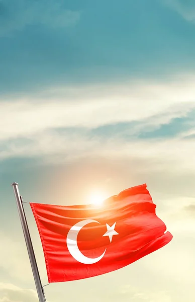 Turkey waving flag in beautiful sky with sun