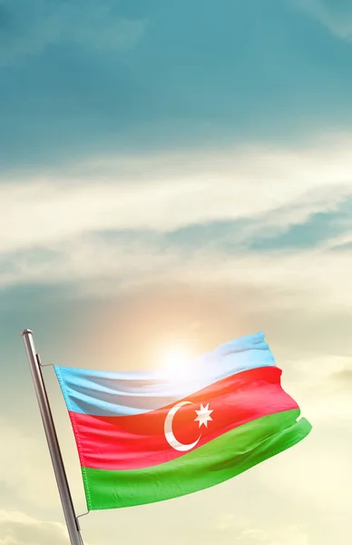 Azerbaijan waving flag in beautiful sky with sun