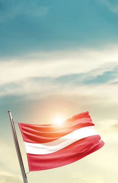 stock image Latvia waving flag in beautiful sky with sun