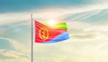 Eritrea waving flag in beautiful sky with sun