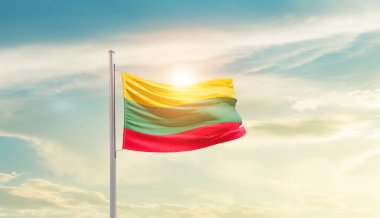 Lithuania waving flag in beautiful sky with sun