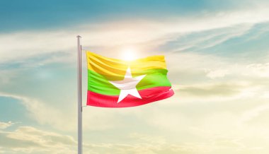 Myanmar güneşli güzel gökyüzünde bayrak sallıyor.