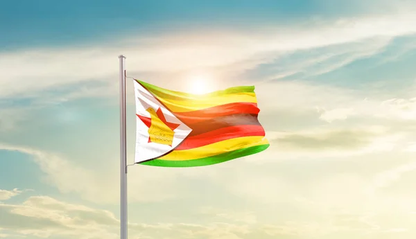 Zimbabwe Waving Flag Beautiful Sky Sun — Zdjęcie stockowe