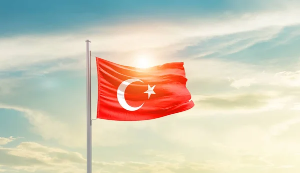 stock image Turkey waving flag in beautiful sky with sun