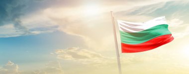 Bulgaria waving flag in beautiful sky with sun