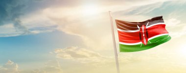 Kenya waving flag in beautiful sky with sun