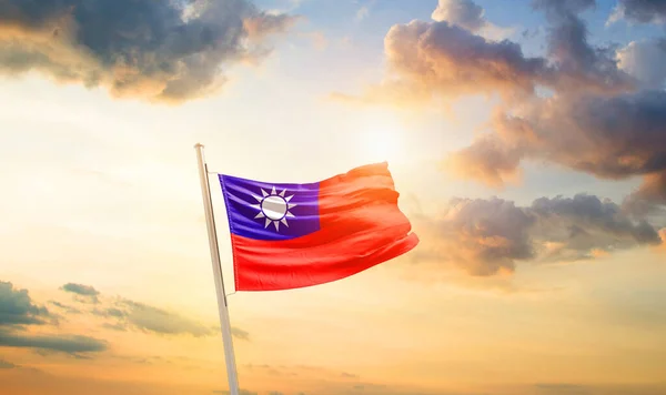 stock image Taiwan waving flag in beautiful sky with clouds and sun