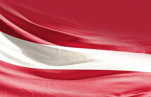 Łotwa Macha Flagą Bliska — Zdjęcie stockowe