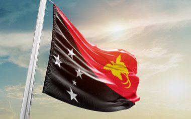 Papua New Guinea waving flag against sky