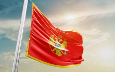 Montenegro waving flag against sky