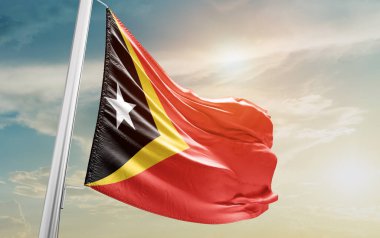 East Timor waving flag against sky