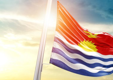 Kiribati bayrağı güneşli gökyüzüne karşı
