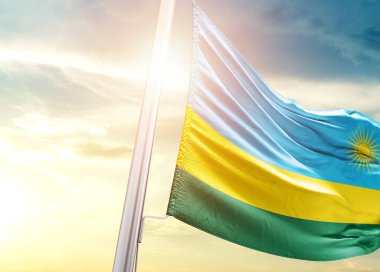 Ruanda bayrağı güneşli gökyüzüne karşı