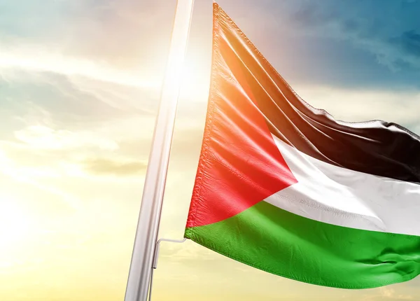 stock image Palestine flag against sky with sun