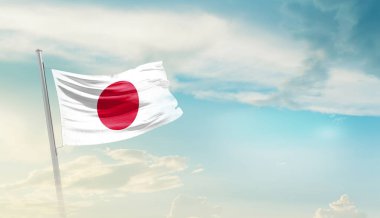 Japonya bulutlu mavi gökyüzüne bayrak sallıyor