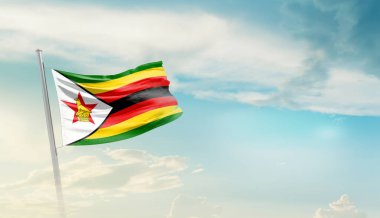 Zimbabwe bulutlu mavi gökyüzüne bayrak sallıyor.
