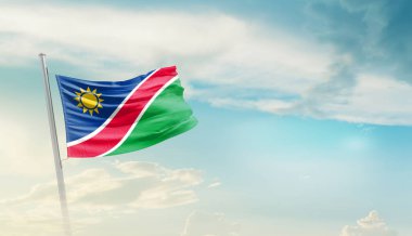 Namibya bulutlu mavi gökyüzüne bayrak sallıyor
