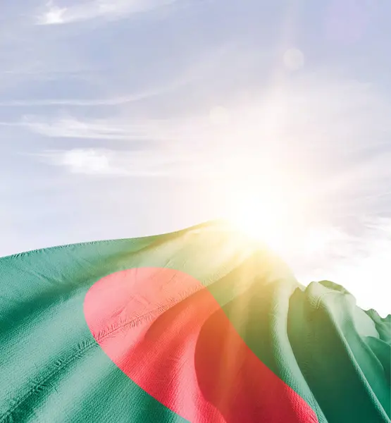 stock image Bangladesh waving flag against blue sky with clouds