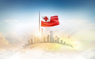 Tonga bayrağı şehir manzarasına karşı dalgalanıyor