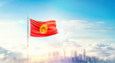 Şehir manzarasının üzerinde Kırgızistan bayrağı simgesi 