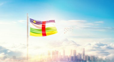 Şehir manzarasının üzerinde Orta Afrika Cumhuriyeti bayrağı simgesi 