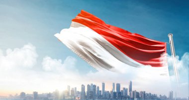 Gökyüzü arka planında Endonezya bayrağı dalgalanması 