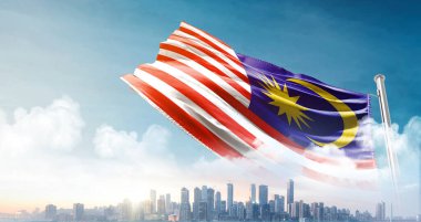 Gökyüzü arka planında dalgalanan Malezya bayrağı 