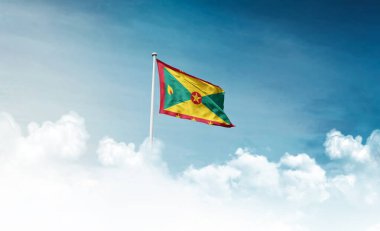 Gökyüzü arka planında dalgalanan Grenada bayrağı 