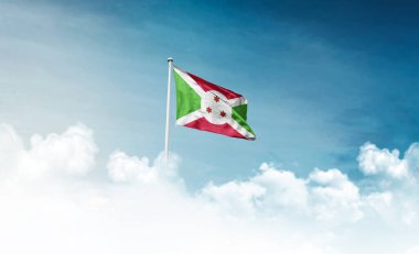 Burundi ulusal bayrağı gökyüzüne doğru dalgalanıyor 