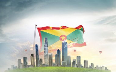 Gökyüzü arka planında dalgalanan Grenada bayrağı 