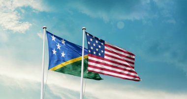  Amerikan ve Solomon Adaları 'nın bayrakları mavi gökyüzü arka planında 
