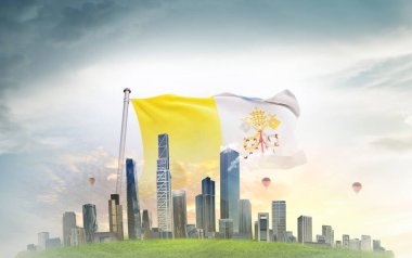  Vatikan Şehri gökyüzüne ve şehir binalarına bayrak sallıyor. 