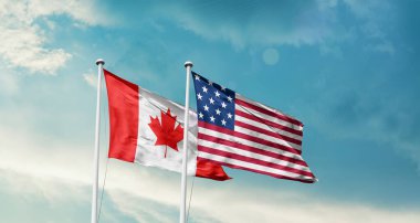   Amerika ve Kanada 'nın bayrakları mavi gökyüzü arka planında 