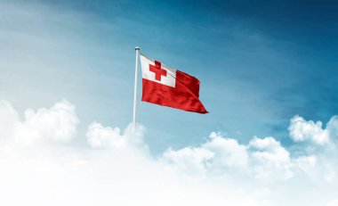 Tonga ulusal bayrağı gökyüzünde dalgalanıyor 