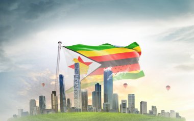 Zimbabwe bayrağı bulutlu arka planda dalgalanıyor 