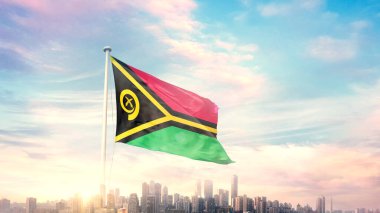 Vanuatu bayrağı mavi gökyüzü arka planında şehir manzarası ile dalgalanıyor 
