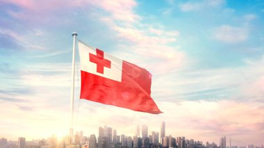 güneşli mavi gökyüzü ve Tonga bayrağı