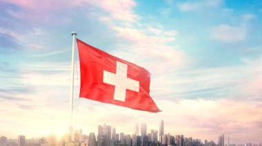 güneşli mavi gökyüzü ve İsviçre bayrağı